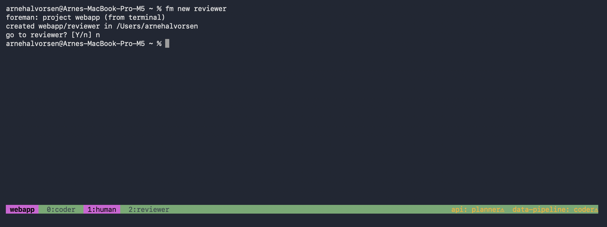 A terminal with the project badge on the left of the status bar and a cross-project waiting ticker on the right